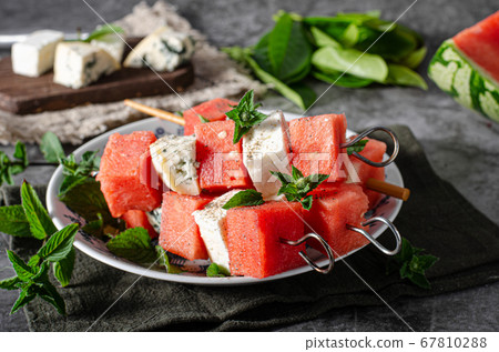 Delicious spicy skewers with watermelon Delicious spicy skewers with watermelon 67810288