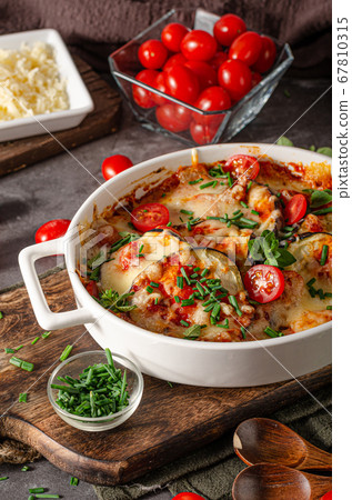Eggplant baked with cheese Eggplant baked with cheese 67810315
