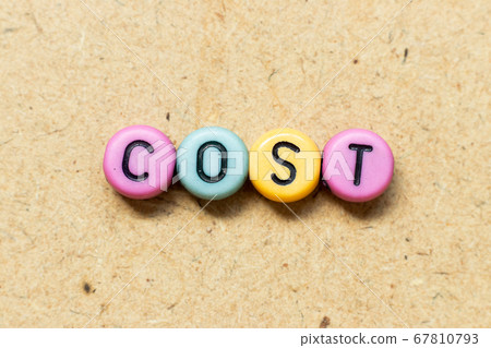 Round color bead with black letter in word cost on wood background Round color bead with black letter in word cost on wood background 67810793