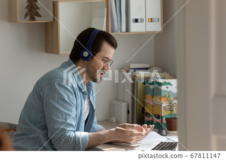 Caucasian male coach have online video call on laptop 67811147