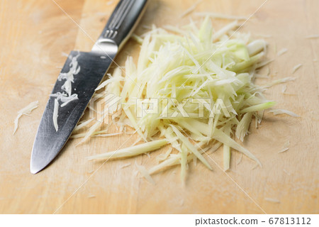 Chopped green papaya fruit for papaya salad Chopped green papaya fruit for papaya salad 67813112