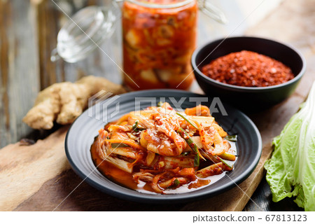 Kimchi cabbage with ingredients on wooden table Kimchi cabbage with ingredients on wooden table 67813123