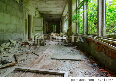 Devastation in corridor of abandoned school in exclusion zone of Chernobyl nuclear power plant 67814267