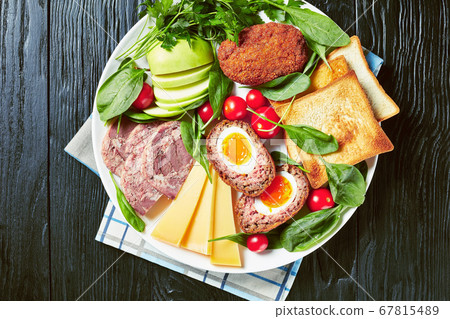 toasts, cheese, apple, scotch eggs, greens, ham 67815489
