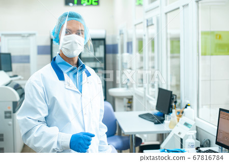 A medical worker, a laboratory assistant in a A medical worker, a laboratory assistant in a 67816784