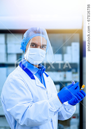 Medical worker, laboratory assistant holds test Medical worker, laboratory assistant holds test 67816786