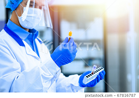 Medical worker, laboratory assistant holds test Medical worker, laboratory assistant holds test 67816787