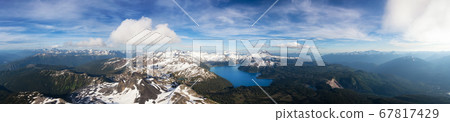 Aerial View of Garibaldi surrounded by Beautiful Canadian Mountain Landscape 67817429