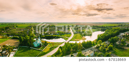 Krupets, Dobrush District, Gomel Region, Belarus. Aerial View Of Old Wooden Orthodox Church Of The Holy Trinity At Sunny Autumn Day 67818669