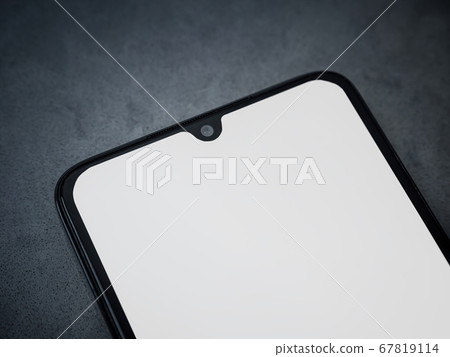 Black mobile smartphone mockup lies on the surface 67819114