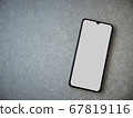 Black mobile smartphone mockup lies on the surface 67819116