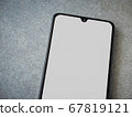 Black mobile smartphone mockup lies on the surface 67819121
