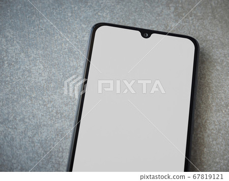 Black mobile smartphone mockup lies on the surface Black mobile smartphone mockup lies on the surface 67819121