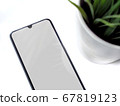 Modern minimalist workspace with black mobile 67819123