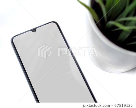 Modern minimalist workspace with black mobile Modern minimalist workspace with black mobile 67819123