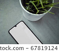 Modern minimalist workspace with black mobile 67819124