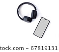 Black wireless headphone and mobile smartphone 67819131