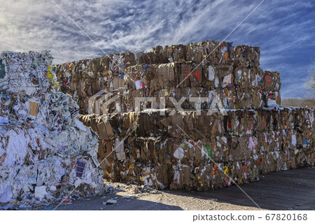 Bales of cardboard and box board. Waste paper for Recycling. Background of paper textures, Paper garbage at the recycling plant 67820168