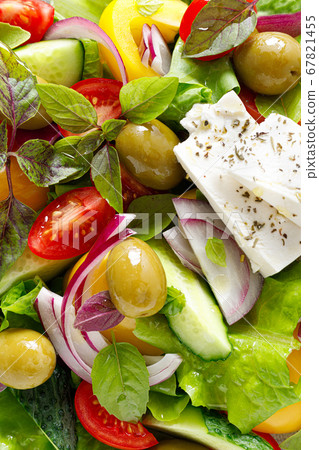 Greek salad. Fresh vegetable salad of cucumbers, 67821455