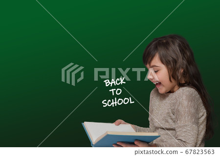 Back to school concept showing laughing cute Back to school concept showing laughing cute 67823563