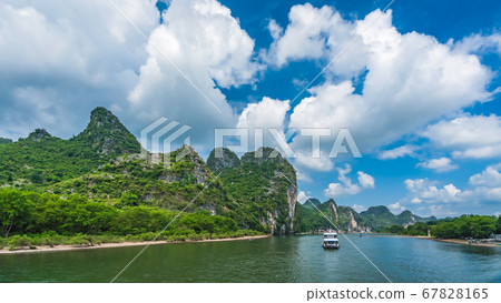 Tourist boat sailing on a Li River in China 67828165