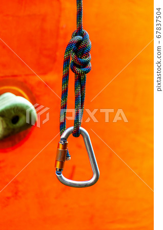 Climbing sports image of a carabiner on a rope 67837504