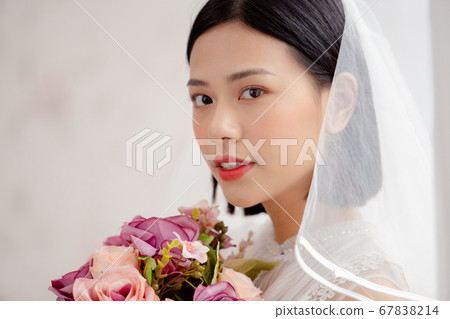 Portrait of woman in prom dress 67838214