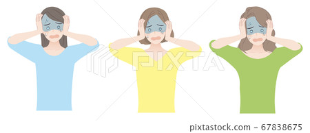 A woman holding her head A woman holding her head 67838675