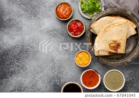 Indian chutneys and flatbread 67841045