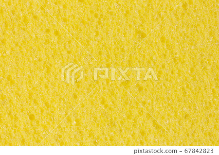 Light yellow ethylene vinyl, acetate foam texture with porosity. Light yellow ethylene vinyl, acetate foam texture with porosity. 67842823