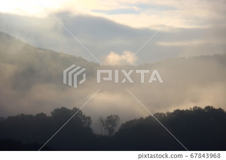 Mountain ridge with fog Mountain ridge with fog 67843968