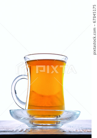 Low angle photo of cup with hot tea with copy space 67845175