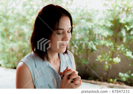 Asian woman believe in God read bible with Asian woman believe in God read bible with 67847231