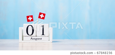 Wooden calendar of August 1st with miniature Wooden calendar of August 1st with miniature 67848156