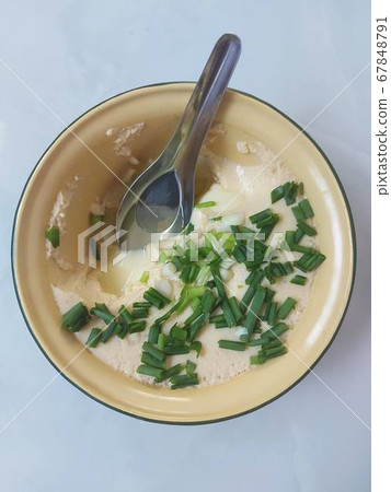 Steamed egg in a bowl Steamed egg in a bowl 67848791
