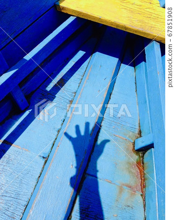 Shadow play on the boat 67851908