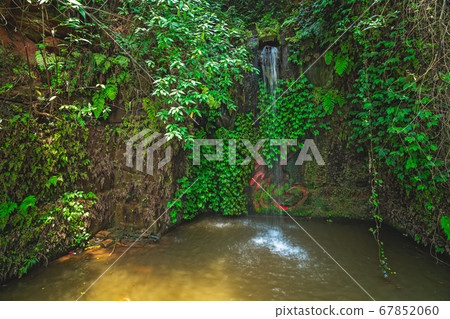Small stream waterfall in Leshan 67852060