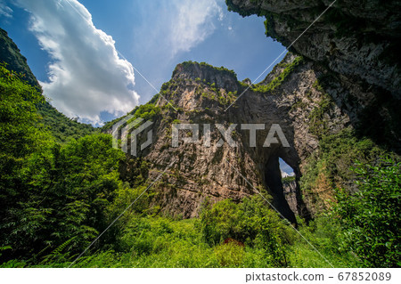 Massive rocky arch in Wulong National Park Massive rocky arch in Wulong National Park 67852089