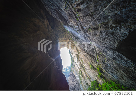 Natural rocky arch fissure in Wulong National Park 67852101