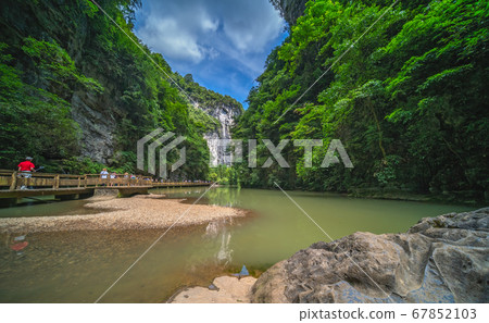 Tourists on a path along river in Wulong National Tourists on a path along river in Wulong National 67852103