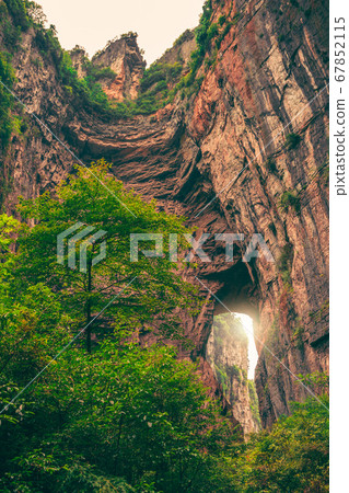 Stunning rocky arch fissure in Wulong National 67852115