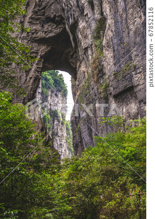 Stunning rocky arch fissure in Wulong National 67852116