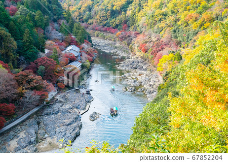 colorful leaves mountains and Katsura river in 67852204