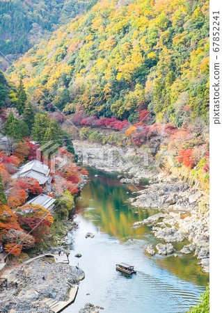 colorful leaves mountains and Katsura river in colorful leaves mountains and Katsura river in 67852241