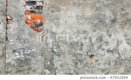 Texture of old brick wall and cracked stucco of 67852894