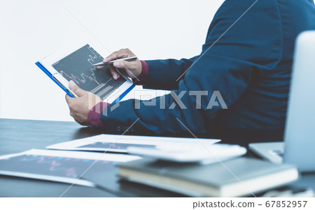Trader businessmen analyze stock graph and report, Trader businessmen analyze stock graph and report, 67852957
