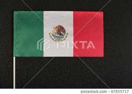 Table flag of Mexico on black background. Striped 67855717
