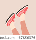 Female legs in the sneakers 67856376