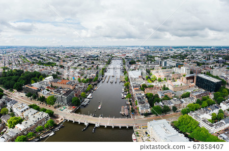 Amsterdam cityscape drone view from above in summer Amsterdam cityscape drone view from above in summer 67858407