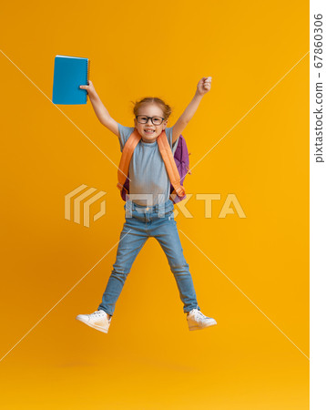Kid with backpack on color background. Kid with backpack on color background. 67860306